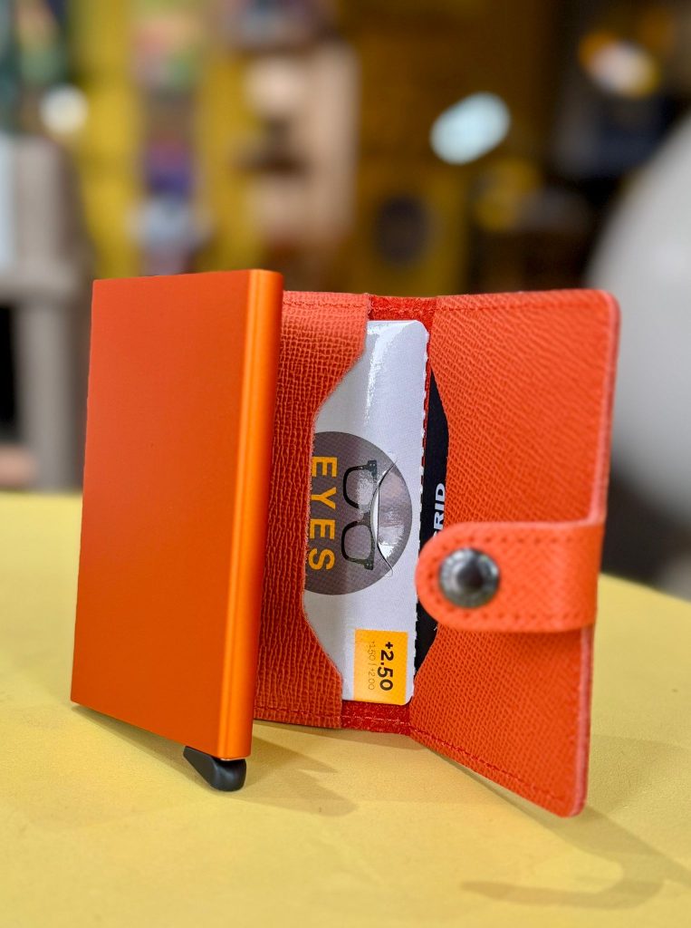EYES on the Menu in an orange Secrid wallet. What's not to love?